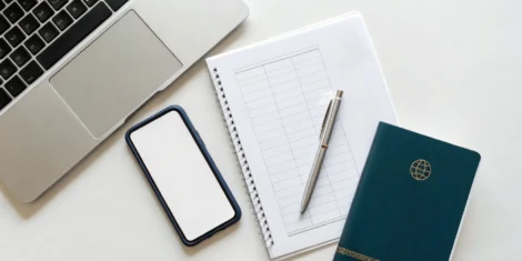 A desk with a passport and checklist, preparing to renew my passport.